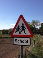 sign "school" near the road