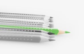 green pencil on black and white background of colored pencils
