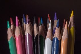 wooden pegs colored pencils