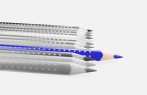 bright pencil on black and white background of colored pencils