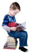 child reading a pile of books