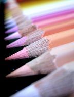 light color pencils on black background