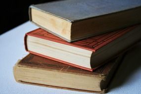 stacked old worn books