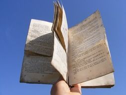 Old book in the hands