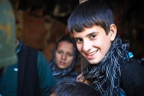 happy schoolboy in afganistan