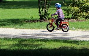 child riding a bike