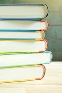 Stack of colorful books on the table