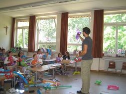 teaching schoolchildren at school