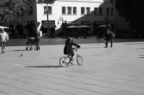 girl on bicycle monochrome photo