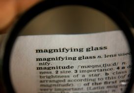 text under a magnifying glass