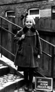 retro photo of a schoolgirl on the steps