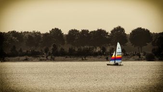 sailboat on the lake in monochrome image