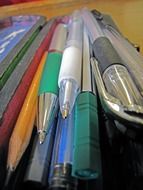 Different colorful pens and pencils