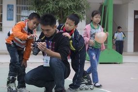 male teacher with children