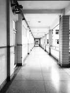 Black and white photo of Corridor in a senior middle school