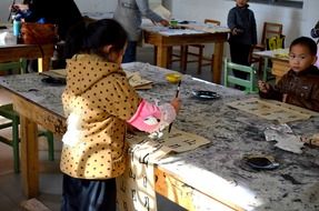 Chinese children learn calligraphy