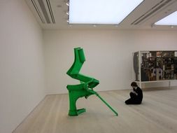 student sketching modern art object in gallery, uk, england, london