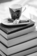 coffee and books in black and white