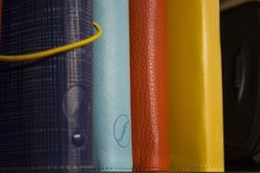 Notebooks in the colored covers