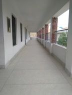 white long corridor on a campus