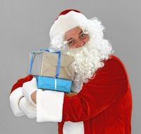 Santa Claus with gifts in his hands