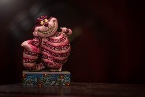 ceramic cheshire cat figurine