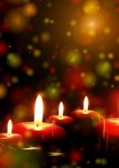 blurred image of burning candles