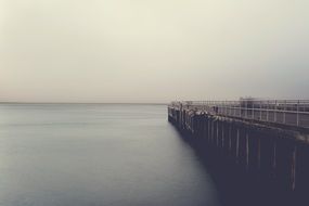 fog over a bridge in the ocean in California