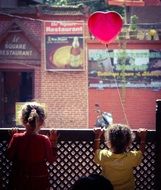 children with love balloon