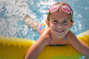 happy girl in the pool