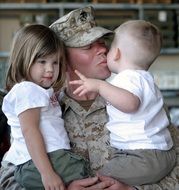 soldier with two children, family love