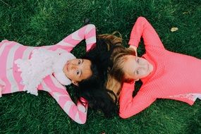 Girlfriends on green grass