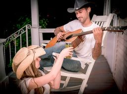 romantic couple with beer and guitar