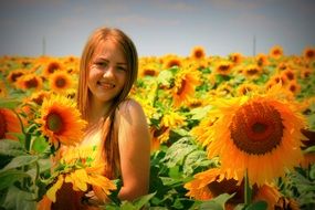 girl on a field of sunflowers