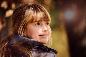 blonde smiling girl with long hair