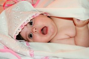 the surprise on the face of the baby