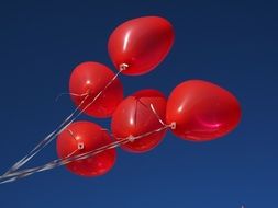 heart shaped balloons in the air