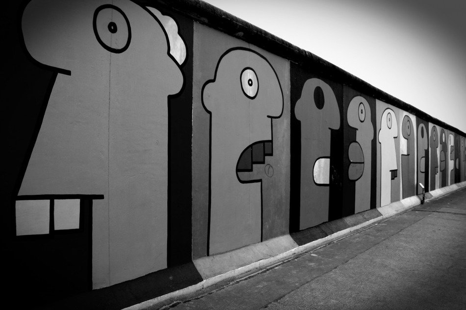 Grey photo of wall graffiti in Berlin
