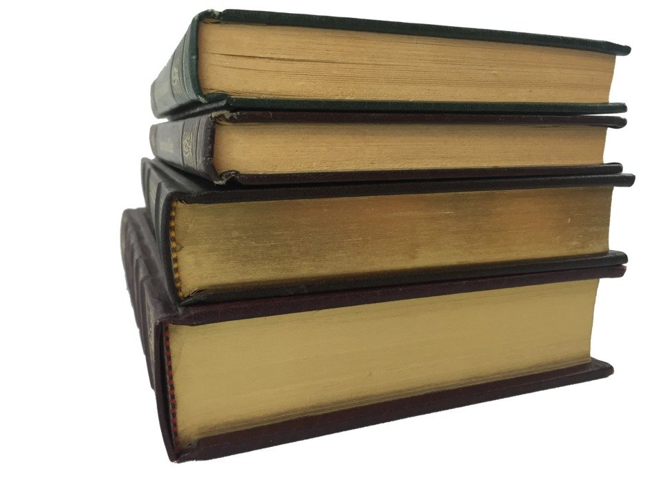 Four open Books in stack at blur background free image download