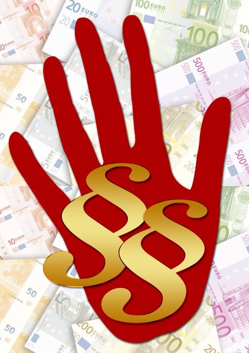 two characters paragraph on the palm on the background of European money
