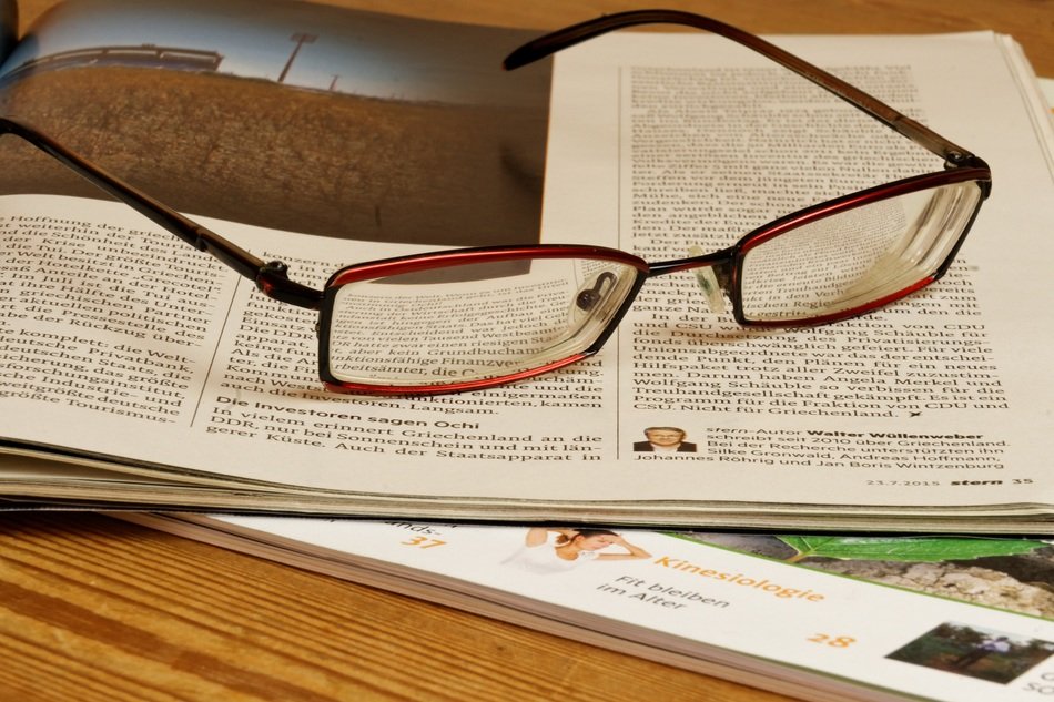 magazine and glasses