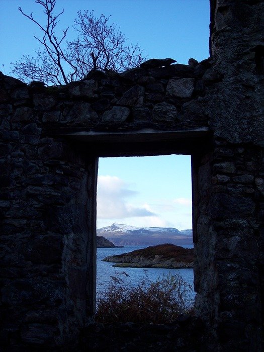 view through the stone wall of the harbor