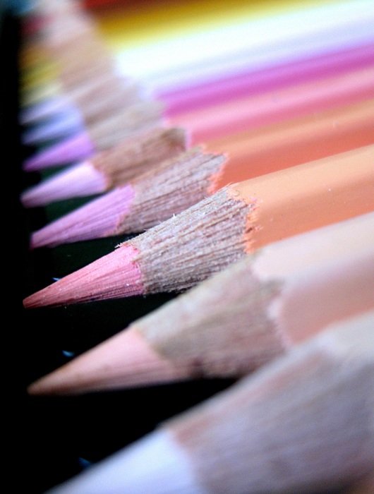 light color pencils on black background
