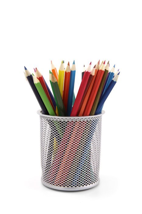 colored pencils in a glass