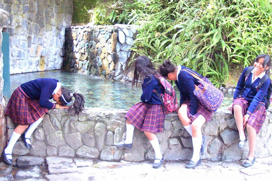 School girls near the waterfall