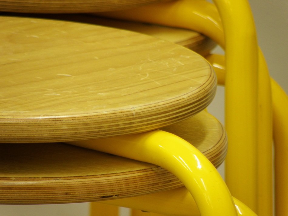 pile of school chairs