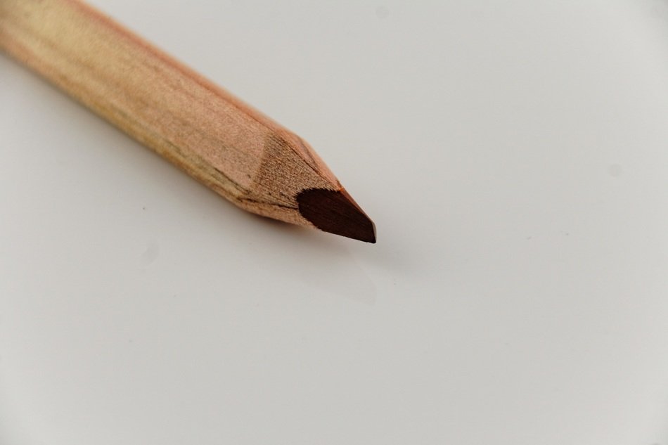 brown core of the pencil on the paper