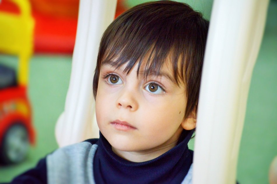 Boy with dark hair and brown eyes