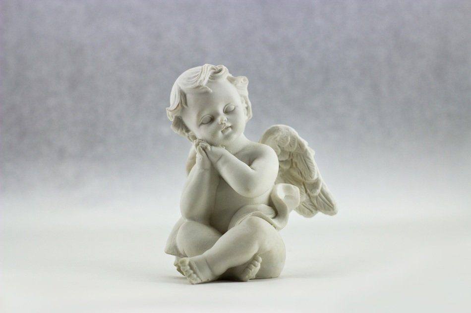 angel wings white ceramic figure