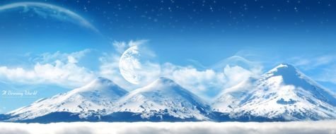 blue sky with clouds over the tops of the mountains with snow